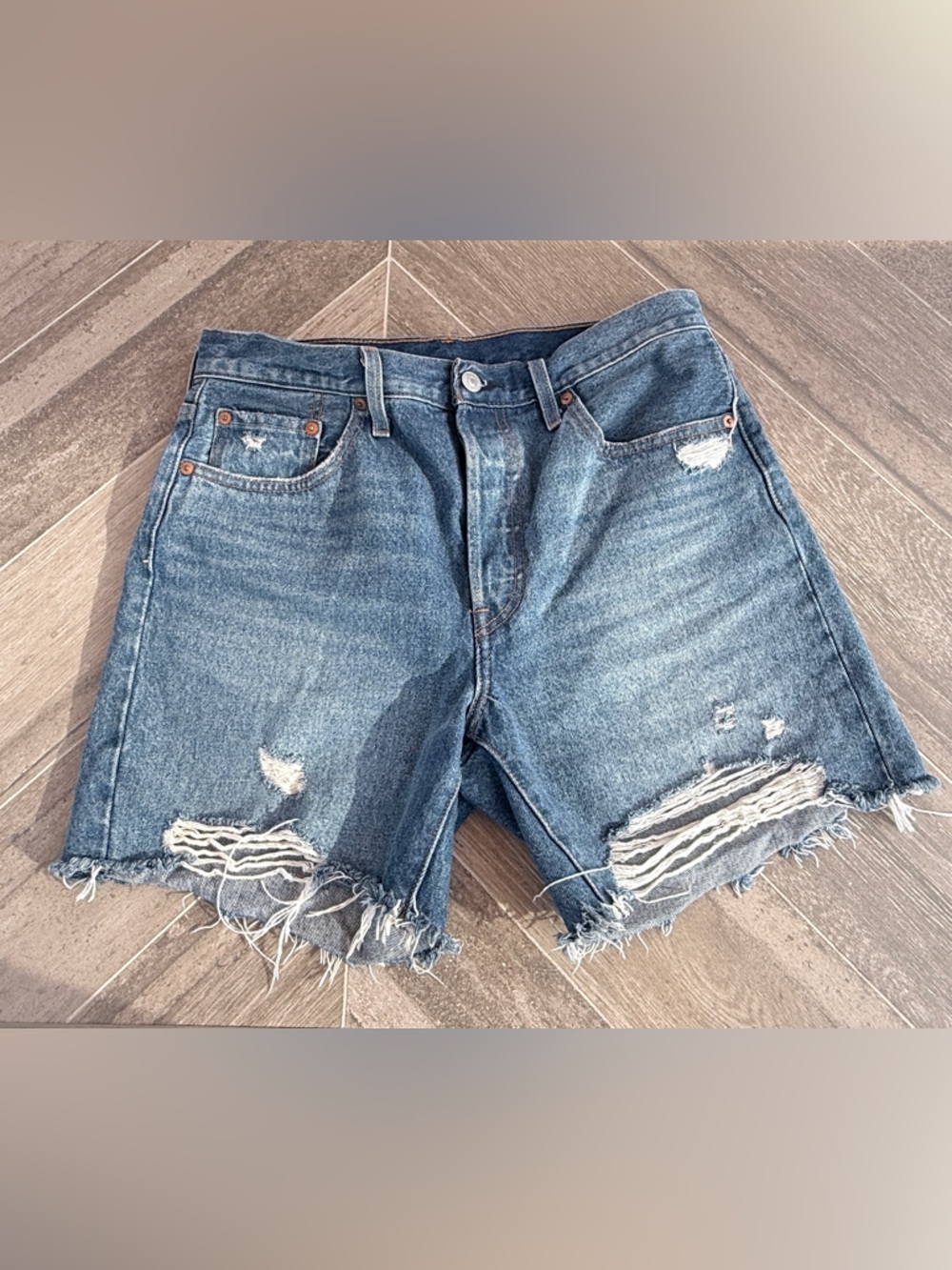LEVI’s Distressed High-Waist Denim Shorts in Medium Blue